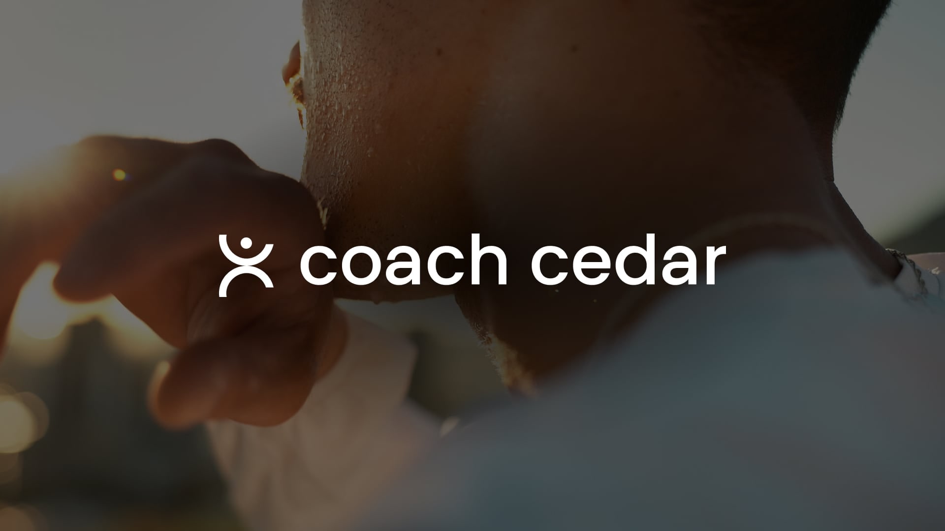 Concept 2: a person-shaped CC mark with a lighter “coach cedar” wordmark, over a close-up of someone stretching.