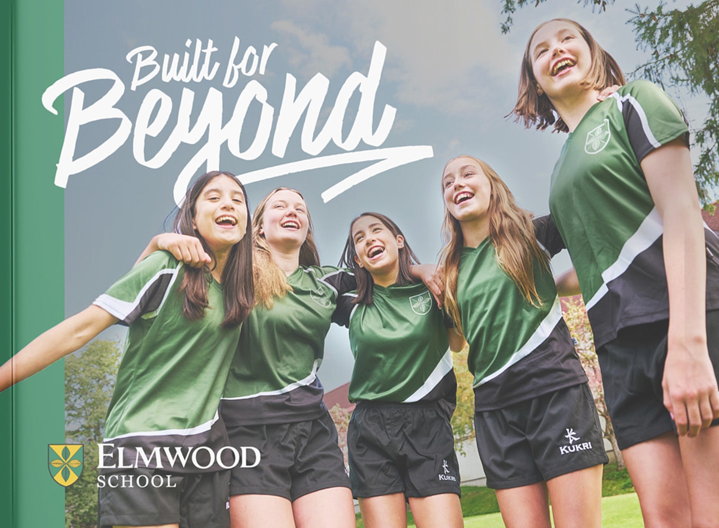 Built for Beyond concept: Elmwood students cheering, with “Beyond” breaking out of its frame.