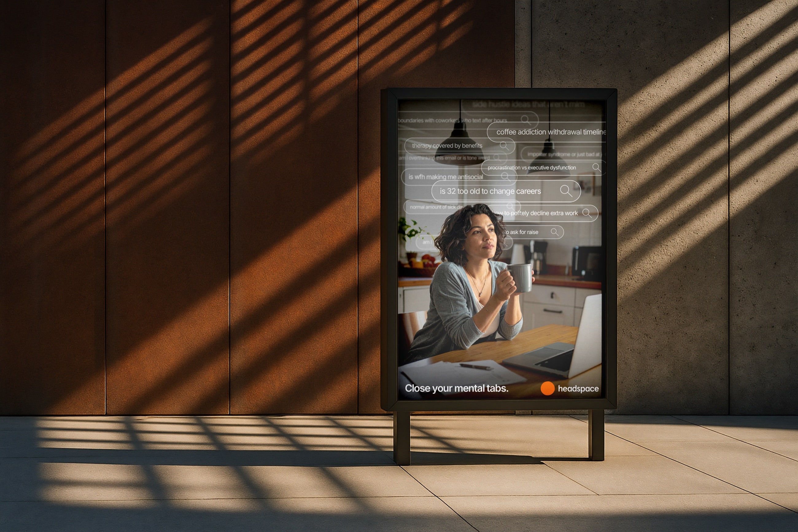 Street poster in a sunlit plaza: a woman at her kitchen table with coffee, search bars over her head: “is 32 too old to change careers”. Close your mental tabs.
