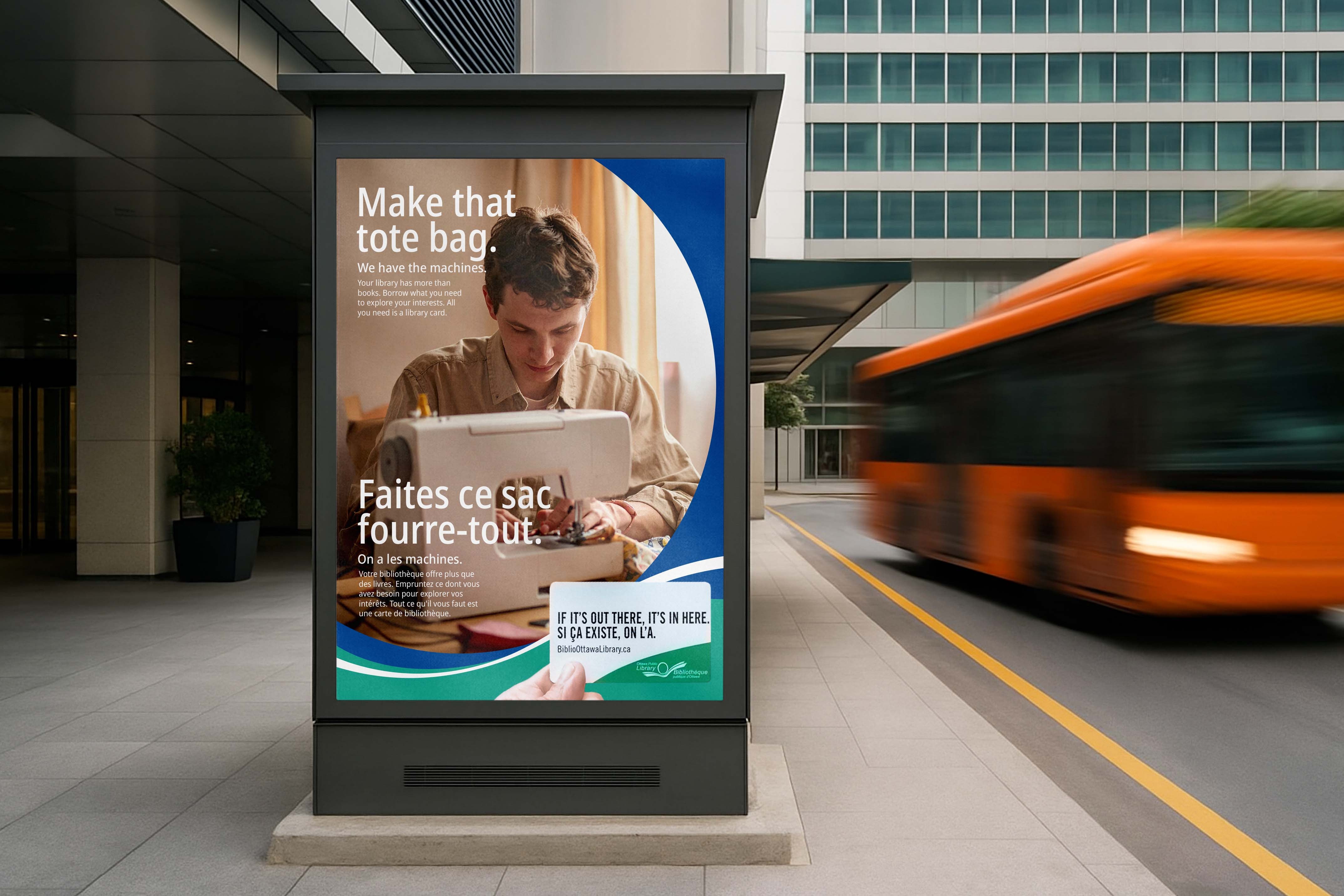 Bus shelter poster as a bus blurs past: a young man at a sewing machine. Make that tote bag. We have the machines. Faites ce sac fourre-tout. On a les machines. A hand holds out an Ottawa Public Library card: If it’s out there, it’s in here.